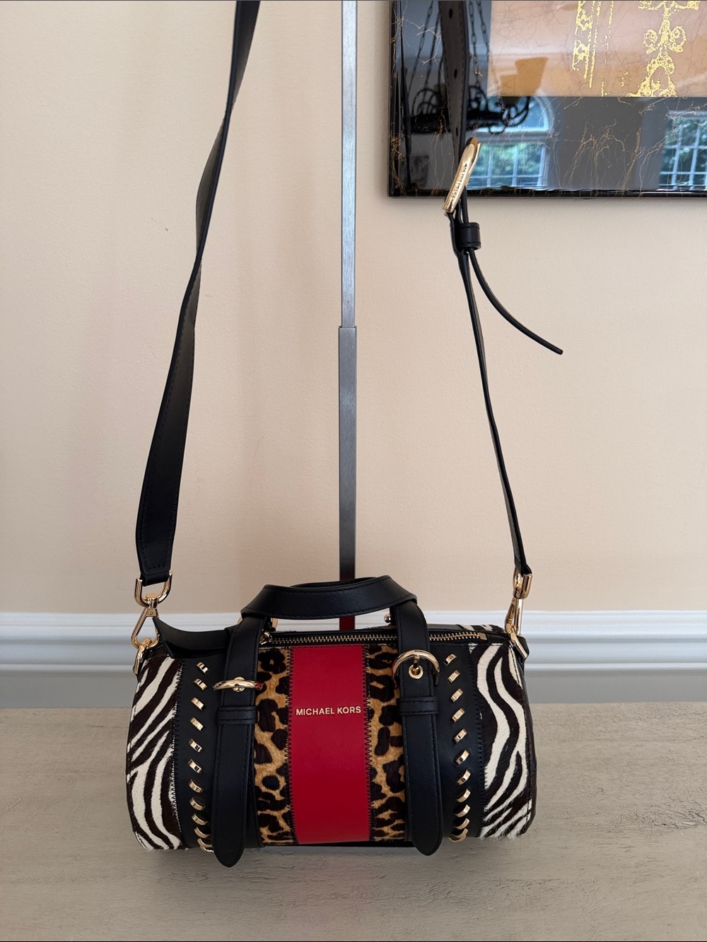 MICHAEL KORS Black Zebra & Leopard Barrel Bag with Red Center Stripe